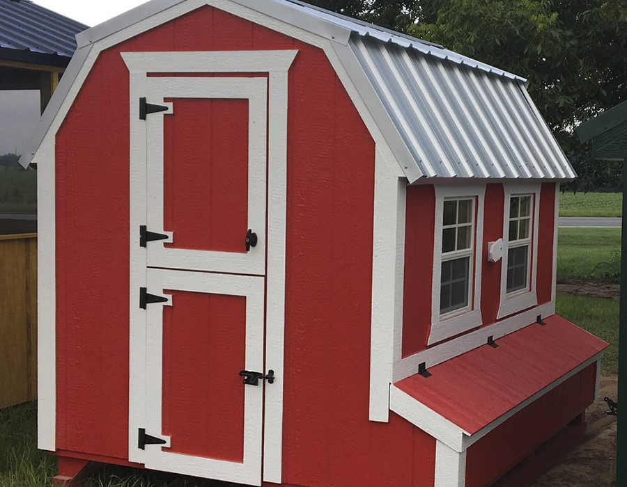 Village Barns - red and white barn-style chicken coop