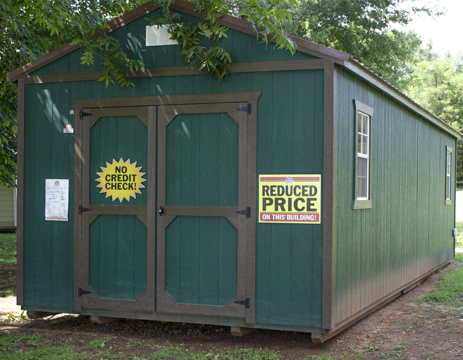 Village Barns - green utility shed